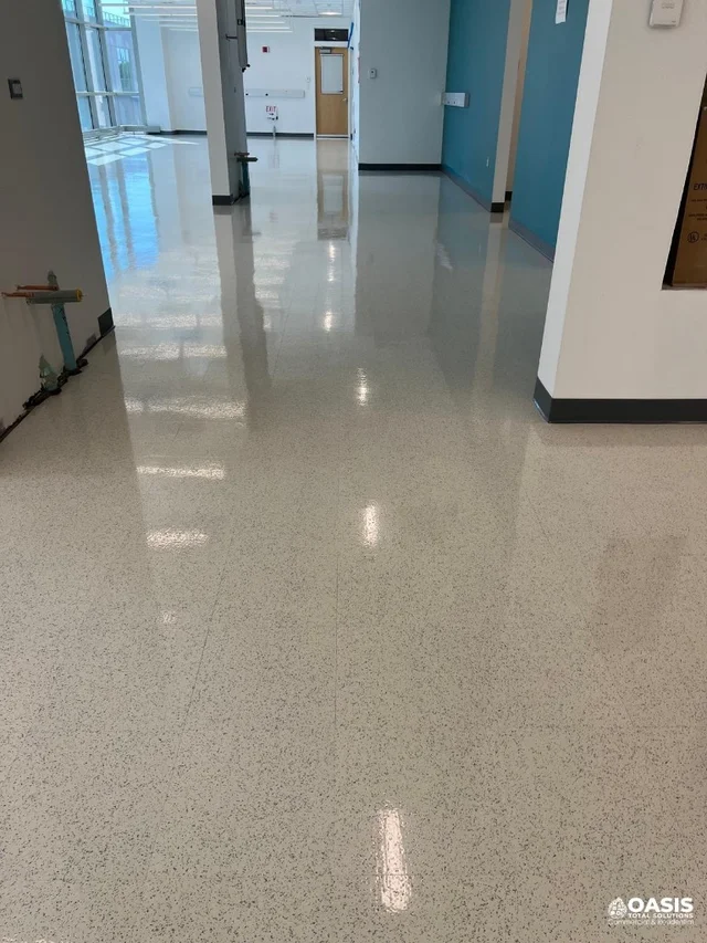 Polished commercial corridor floor by Oasis Total Solutions