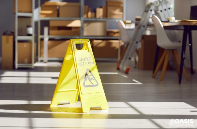Caution wet floor sign in clean office—professional janitorial service