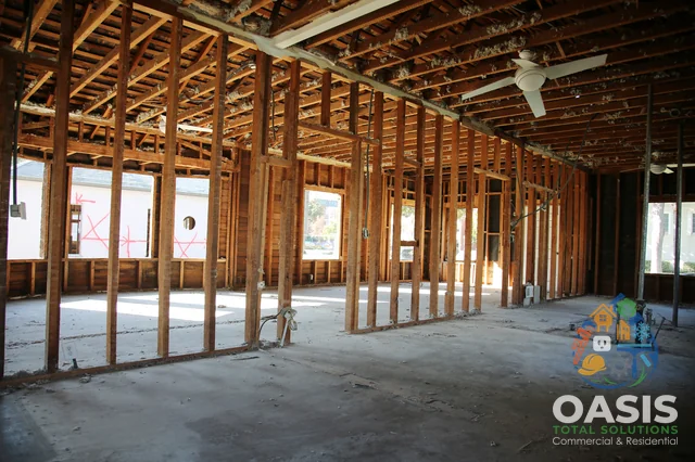 Full interior gut—wood studs exposed throughout