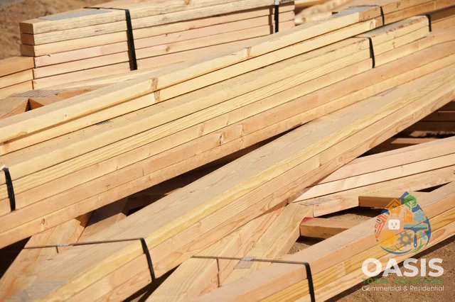 Framing lumber on site ready for layout and cuts