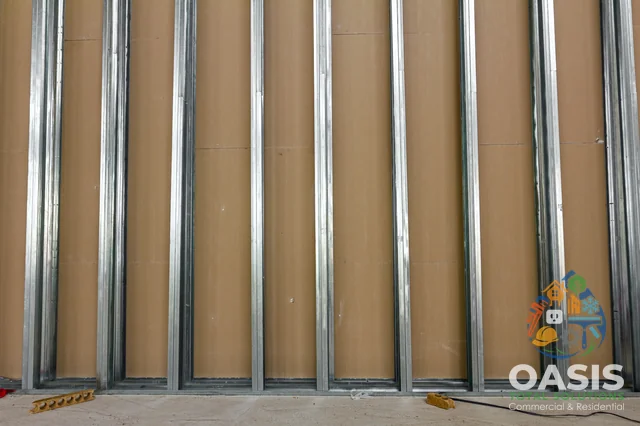 Metal stud wall with sheathing backing