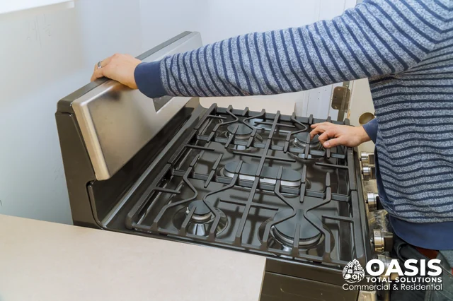 Setting a new gas range in the cutout