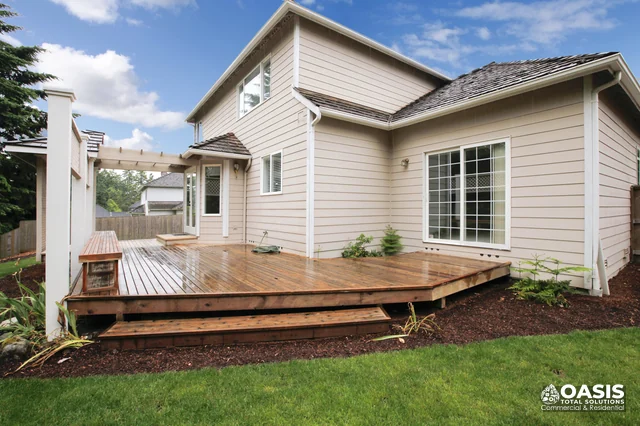 Backyard wood deck attached to home