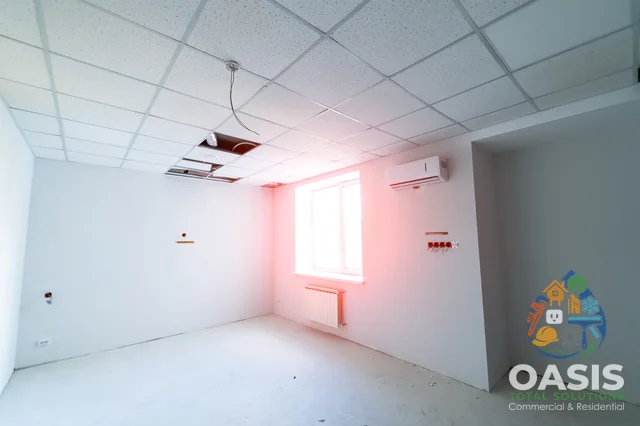 Suspended ceiling with acoustic tiles and utilities rough-in