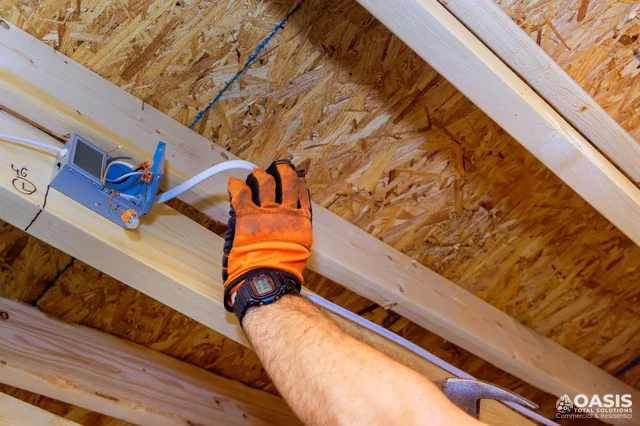 Routing cable through ceiling joists