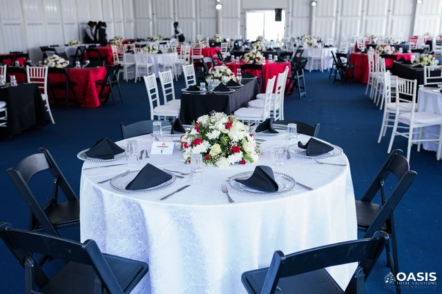Banquet hall with round tables and floral centerpieces