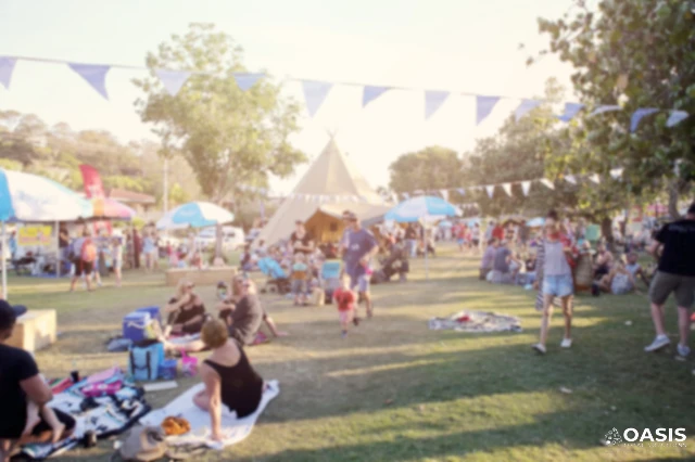 Outdoor community fair with families and bunting