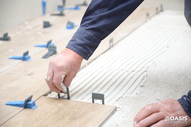 Tile leveling system clips during installation