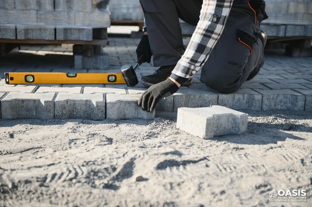 Setting concrete paver edging for walkway