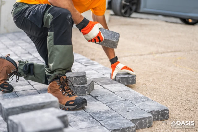 Installing interlocking concrete pavers for driveway or path
