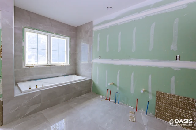Bathroom remodel with tub rough-in and drywall prep