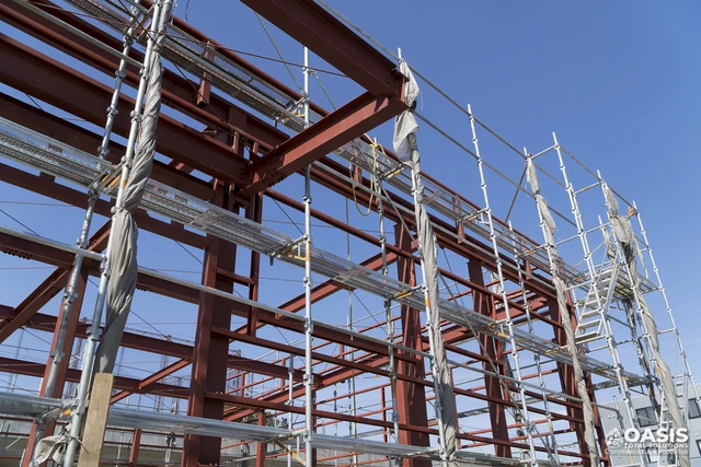 Structural steel frame with scaffolding