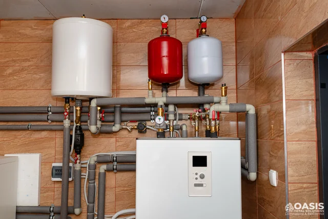 Boiler room with expansion tanks and piping