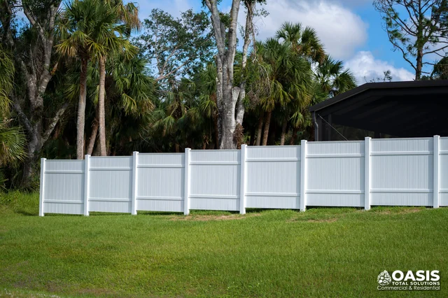 White vinyl fence with posts