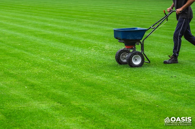 Fertilizer spreader on lawn