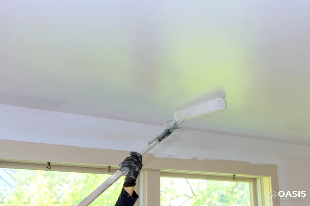 Rolling a living room ceiling for a smooth finish