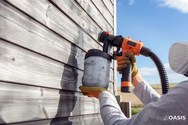 Using a paint sprayer on exterior wood siding