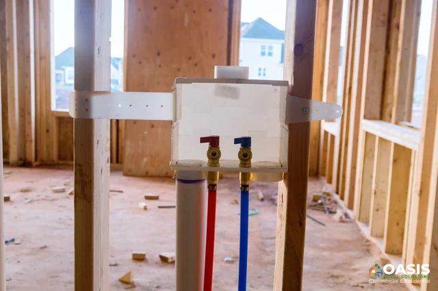 Laundry box mounted between studs with supply valves