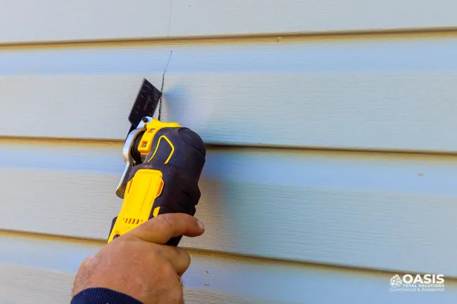 Oscillating multi-tool cutting through lap siding for a clean opening