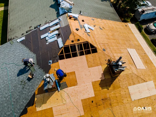 Aerial view of re-roof with new sheathing, underlayment and staging