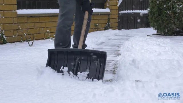 Shoveling a residential walkway after snowfall
