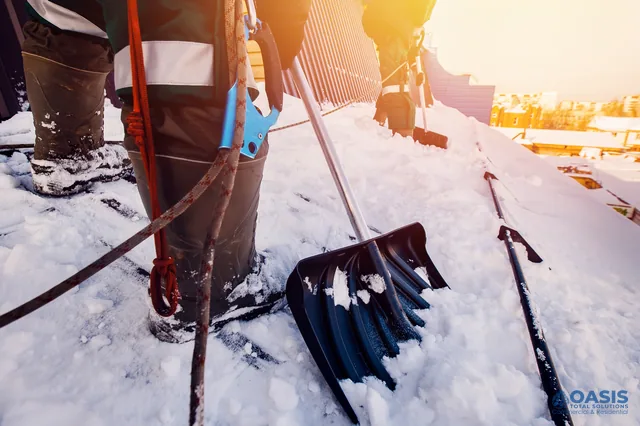 Ropes and shovel on roof during snow removal operations